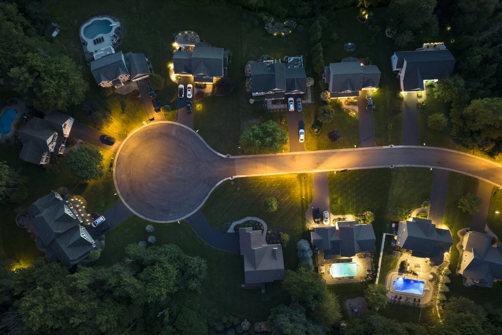 residential illuminated homes at night in suburban 2024 12 07 00 16 11 utc min